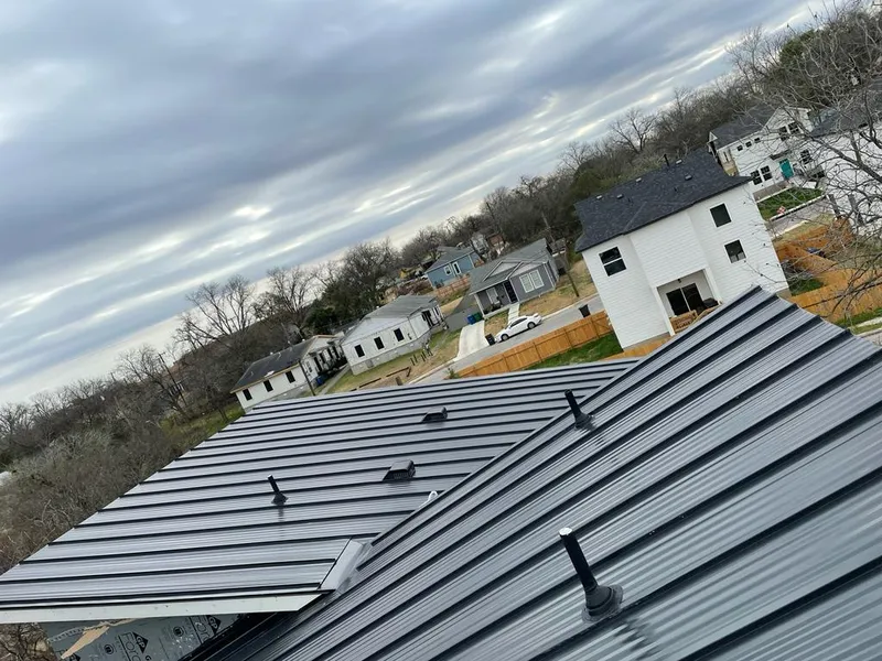 Standing seam metal roof panels with vents for Skylight Repair in Waveland